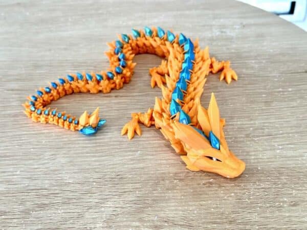 Crystal Dragon Orange with blue green crystal