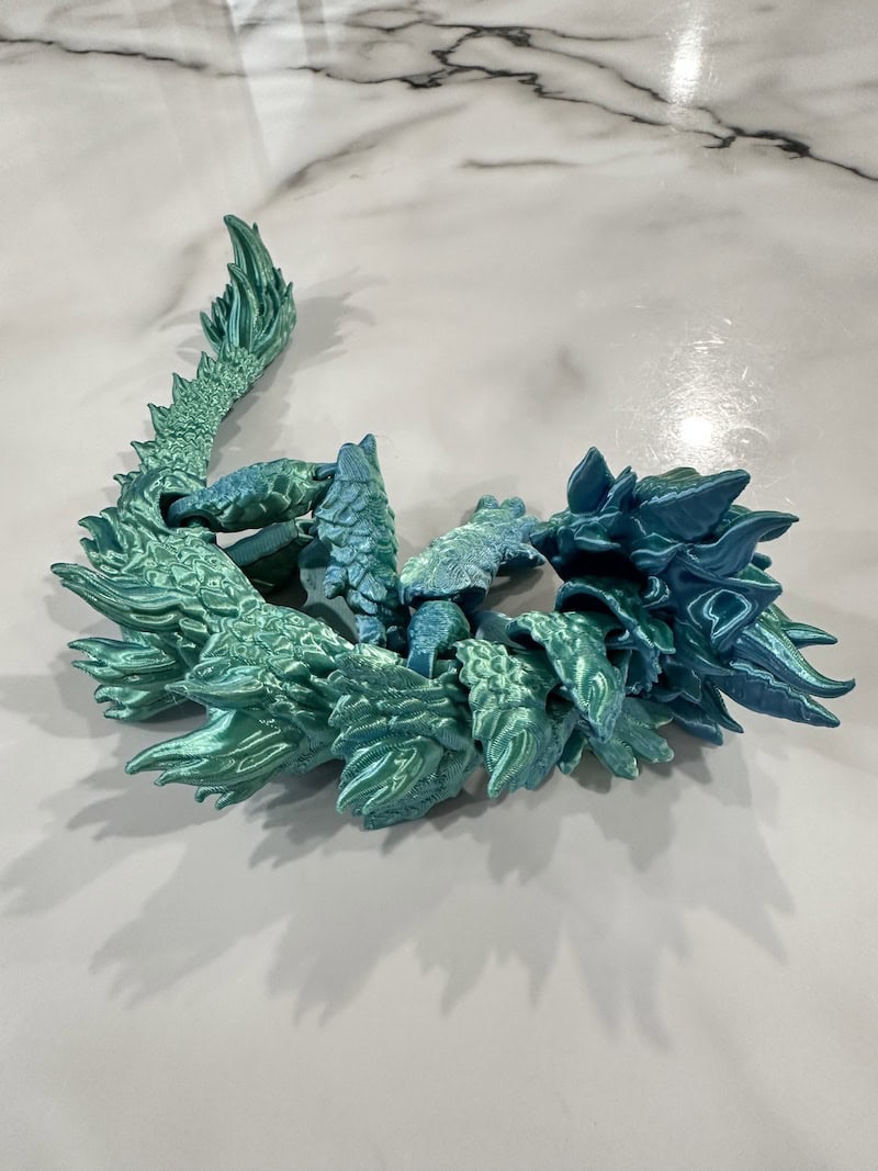 blue green silk fortune dragon