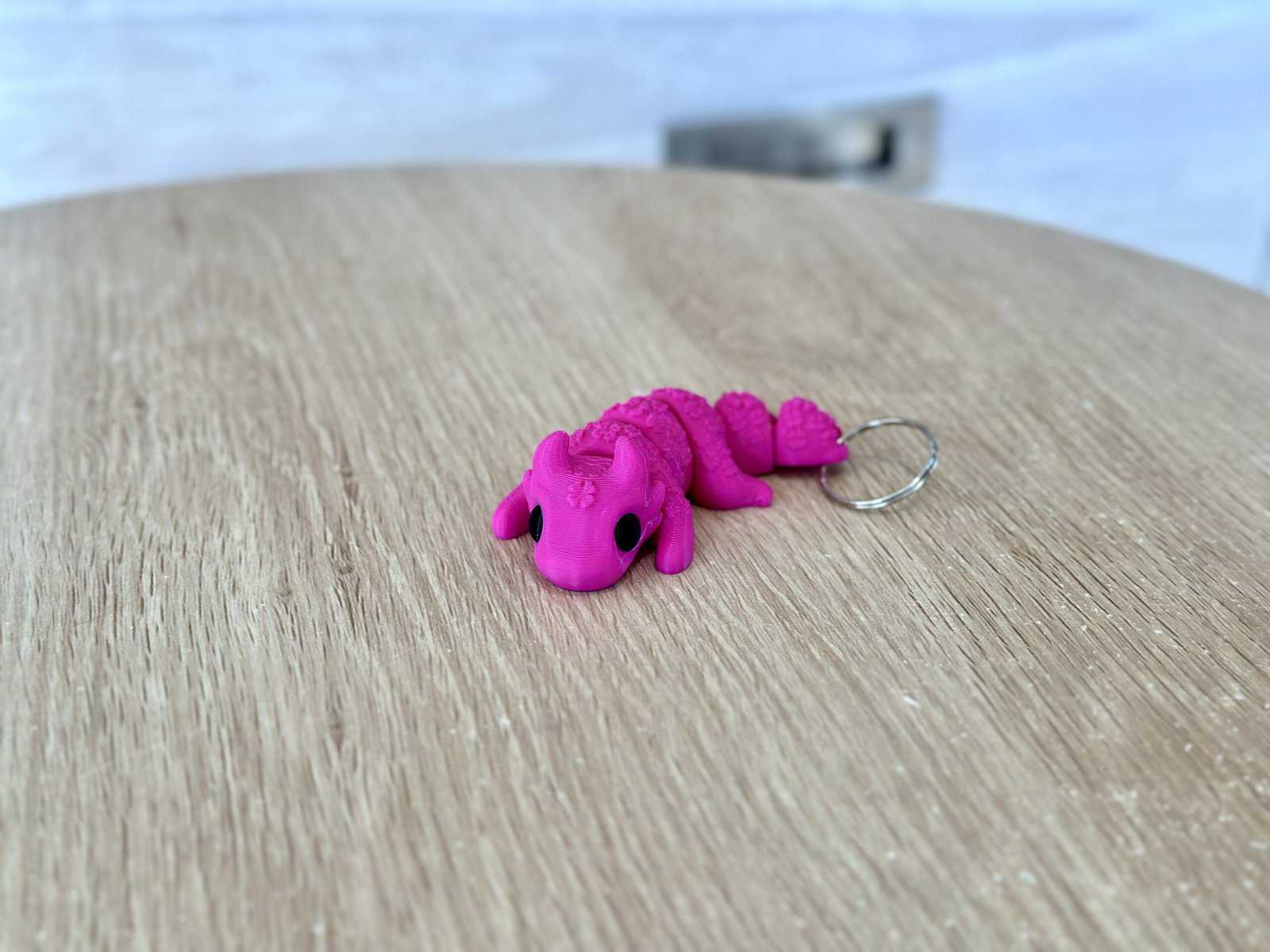 Baby Lucky Dragon, flexi sensory fidget pink