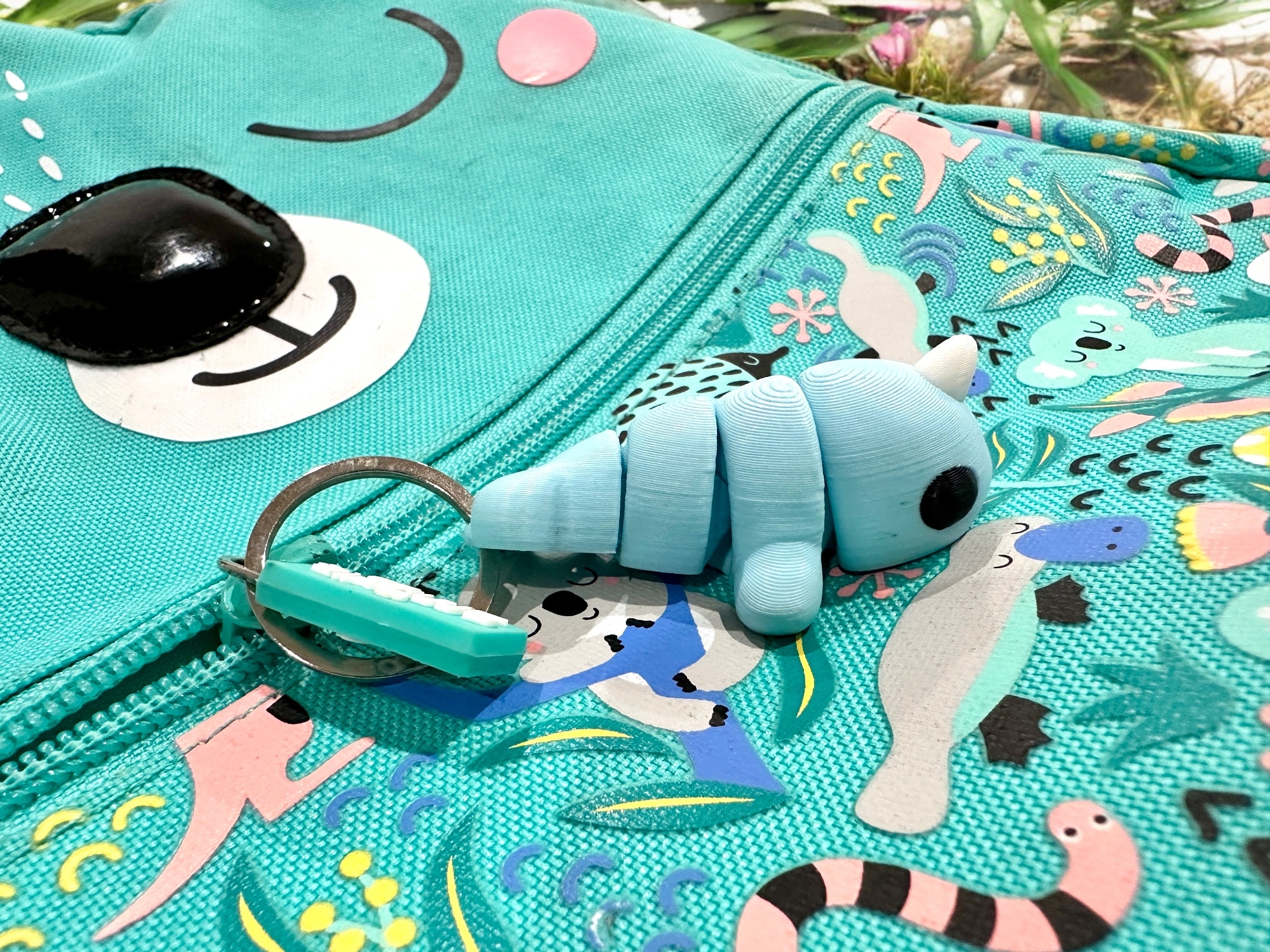 Flexi Narwhal Keyring on bag